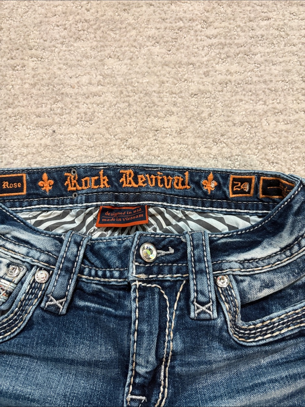 Rock Revival Blue Denim Jeans with Orange Embroidered Waistband
